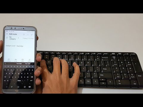How do I connect my wireless keyboard to my phone?